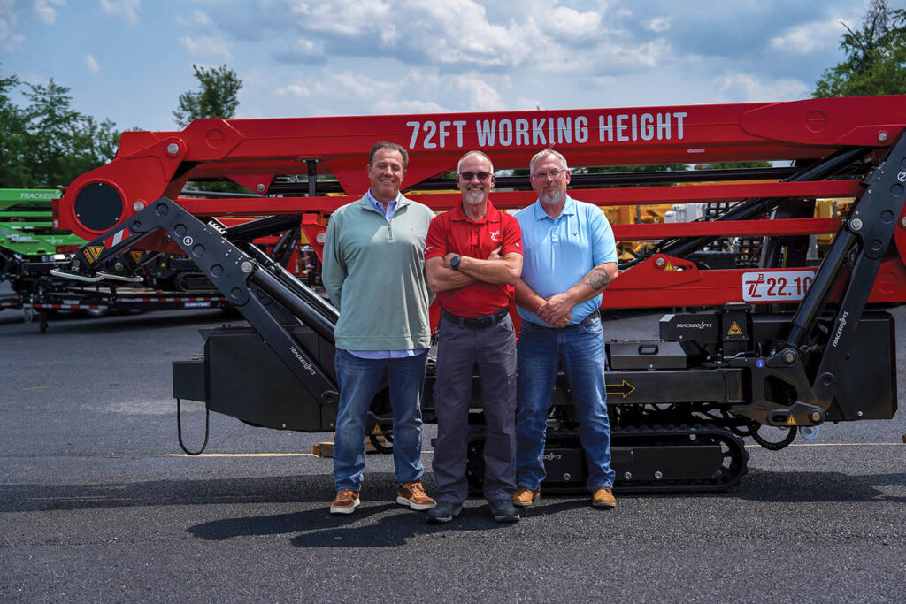 From left, Tracked Lifts’ Wes Snapp, Eric Bailey and Dan Bishop in front of the TL 22.10. All photos courtesy of Tracked Lifts.